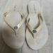 Coach Shoes | Coach Abbigail Flip Flops Turnlock Logo White Thong Sandals Size 7/8 | Color: Cream | Size: 7.5