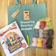 Wallace & Gromit Cracking Crochet Kit. Book, 12 luxury yarns, Crochet Hook, Enamel Pin Badge in Organic Cotton 'Cracking Crochet Gromit' Bag