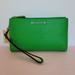 Michael Kors Bags | Michael Kors Jet Set Double Zip Pebbled Leather Wristlet-Palm | Color: Green | Size: 7.25” W X 4” H X 1.5” D