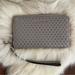 Michael Kors Bags | Michael Kors Jet Set Zip Clutch Wallet | Color: Gray/Silver | Size: 7”X1”X4” Strap 6”