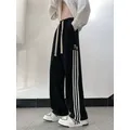 Zoki pantaloni sportivi neri a righe Streetwear da donna pantaloni a gamba larga con lettera a vita