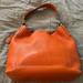 Dooney & Bourke Bags | Dooney & Burke Pebbled Leather Shoulder Bag. Good Condition, Cloth Bag Included. | Color: Orange | Size: Os