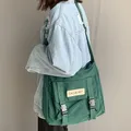 Sac messager en nylon imperméable pour femme sac postier chic cartable en toile pour femme mode