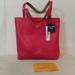 Dooney & Bourke Bags | Dooney Bourke Waverly Reversible Tote In Pink/Tan | Color: Pink/Tan | Size: Os