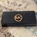 Michael Kors Accessories | Michael Kors, Pebbled, Leather Wallet In Navy Blue With Gold Trim | Color: Blue | Size: Os