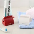 Distributeur de dentifrice multifonction portable tube à rouler en plastique presse-dentifrice