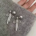 Coreano elegante semplice Bowknot grigio perla orecchini pendenti lunghi per le donne moda dolce