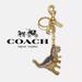 Coach Bags | Coach Rexy Bag Charm Signature Canvas Metal Logo C Dinosaur Keychain Link 73411 | Color: Gold | Size: Os