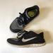 Nike Shoes | Nike Free 4.0 Women's Size 9 Running Shoes Black Gray Athletic Trainer Sneaker | Color: Black | Size: 9