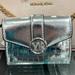 Michael Kors Bags | Michael Kors Carmen Medium Logo And Faux Leather Wallet Silver Nwt | Color: Silver | Size: Medium