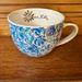 Lilly Pulitzer Dining | Lilly Pulitzer Ceramic Mug With Floral Design And Gold Handle | Color: Blue/Purple | Size: Os