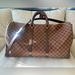 Louis Vuitton Bags | Louis Vuitton Damier Ebene Keepall Bandoulire 55 | Color: Brown | Size: Os