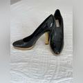 Michael Kors Shoes | Michael Kors Black/Gold Heels. Size 8.5 | Color: Black | Size: 8.5