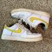 Nike Shoes | Nike Air Force 1 With Yellow Swoosh, Women’s 10/Men’s 8.5 | Color: White/Yellow | Size: 10