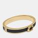 Coach Jewelry | Nwt $79 Coach Bangle | Color: Gold/White | Size: Black/Gold