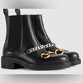 Gucci Shoes | Gucci Leather Bootie Flores Calf Horsebit Chain Boot | Color: Black/Gold | Size: 39