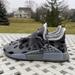 Adidas Shoes | Adidas Nmd Human Race X Pharrell Animal Print Ash Id1531 Size 10 New | Color: Black/Gray | Size: 10