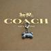 Coach Bags | Coach Silver Dog Bone Wristlet Bag Charm | Color: Silver | Size: Os