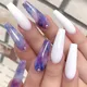 Faux ongles artificiels réutilisables à pression 24 pièces longs violet et blanc dégradé