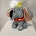 Disney Toys | Disney Parks Exclusive Dumbo 9" Plush Circus Outfit With Black Crow Feat | Color: Gray/Yellow | Size: One Size