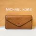 Michael Kors Bags | Michael Kors Jet Set Travel Large Envelope Continental Wallet Embossed Mk Brown | Color: Brown | Size: Os