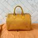 Louis Vuitton Bags | Louis Vuitton Women's Tassil Yellow Speedy 25 Epi Leather Handbag | Color: Yellow | Size: Os