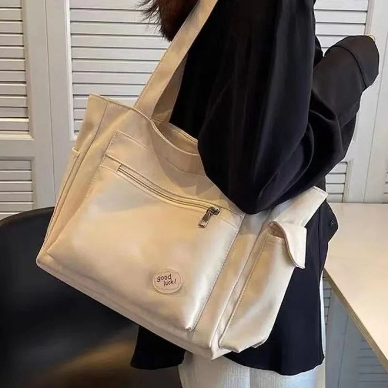 Sac à bandoulière mode femme classe grande capacité sac fourre-tout étudiant nouveau sac à main de banlieue en toile sacs de transport cabas sac écologique
