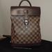 Louis Vuitton Bags | Fundraiser: Louis Vuitton Authenticated Soho Backpack Damier Ebene | Color: Brown/Tan | Size: 9.8x 12.5 X 4 Inches