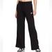 Nike Pants & Jumpsuits | Nike Sportswear Club Fleece Black Wide Leg Sweatpants | Color: Black | Size: S