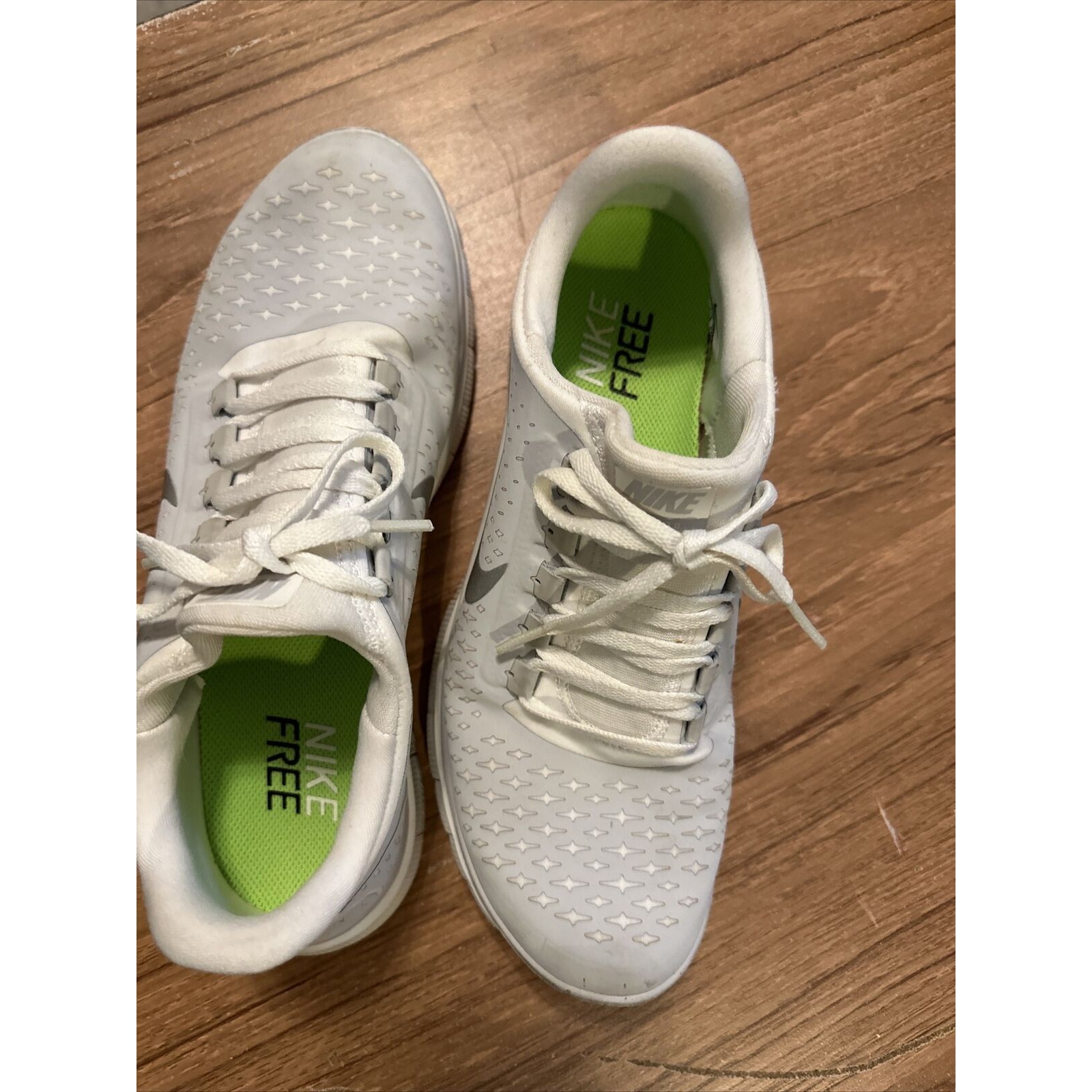 Nike Shoes | Grey And White Women's Nike Rn Free Sneakers - Running Shoes With Nike Logo 10 | Color: White | Size: 10