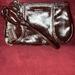 Coach Bags | Coach Dark Brown Patent Leather Wristlet With Charm | Color: Brown | Size: Os