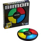 Hasbro Gaming Simon Handheld Electronic Memory Game With Lights and Sounds for Kids Ages 8 and Up Includes Simon game unit and instructions.