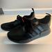 Adidas Shoes | Adidas Nmd R1 Core Women’s Triple Black Lightweight Athletic Shoes Size 9.5 | Color: Black/Red | Size: 9.5