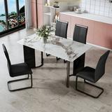Table and chair set. 1 table and 4 chairs. Rectangular dining table white imitation marble tabletop MDF table legs with gold metal decorative strips. Black chair WQ-602