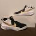 Nike Shoes | Nike Boys Team Hustle D10 | Color: Gold/White | Size: 6.5bb