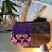 Coach Accessories | Coach Mini Signature Wristlet Change Purse Patch Zip | Color: Brown/Purple | Size: Os