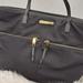 Michael Kors Bags | Michael Kors Tote Bag Black Two Front Zip Pockets Two Back Pockets | Color: Black | Size: Os