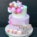 Décoration de Gâteau en Forme d'Éléphant Rose Lettres Dorées Boule Rose et Blanche pour