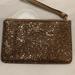 Coach Accessories | Glitter Gold Coach Wristlet | Color: Gold | Size: Os