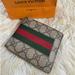 Gucci Bags | Gucci Gg Bifold Mens Wallet Brown Sherryline Pvc Leather With Free L-V Paperbag | Color: Brown/Red | Size: Os