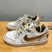 Nike Shoes | Nike Court Borough Low White Leather With Gold Swish | Color: Gold/White | Size: 4.5bb