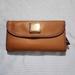 Dooney & Bourke Bags | Dooney & Bourke Pebbled Leather Continental Wallet | Color: Brown | Size: Os