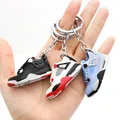 Porte-clés de chaussures de sport 3D souvenir de fan de chaussures de sport modèle pendentif clé