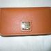 Dooney & Bourke Accessories | Dooney & Bourke Leather Phone/Card Case | Color: Brown | Size: 5-1/2"W X 3"H X 1"D