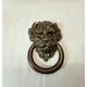 Large antique door knocker - a large antique cast bronze lion's head / mask door knocker, with replacement brass strike plate & fixing bolts