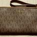 Michael Kors Bags | Michael Kors Large Wristlet Purse Tan And Brown | Color: Brown/Tan | Size: Os