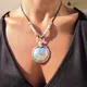 Collier pendentif rond vintage pour femme style ethnique bohème fausse turquoise perlée cuir