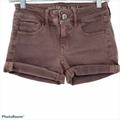 American Eagle Outfitters Shorts | American Eagle Super Stretch Midi Cuffed Hem Denim Shorts | Color: Tan | Size: 0