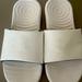 Under Armour Shoes | Good Condition White Under Armour Women Slippers | Color: White | Size: 9