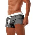 Per uomo Boxer da surf Pantaloncini da mare Boxer da mare Slip da bagno A cordoncino Vita elastica Tasca con cerniera Tinta unica Traspirante Asciugatura rapida Breve Informale Giornaliero Spiaggia